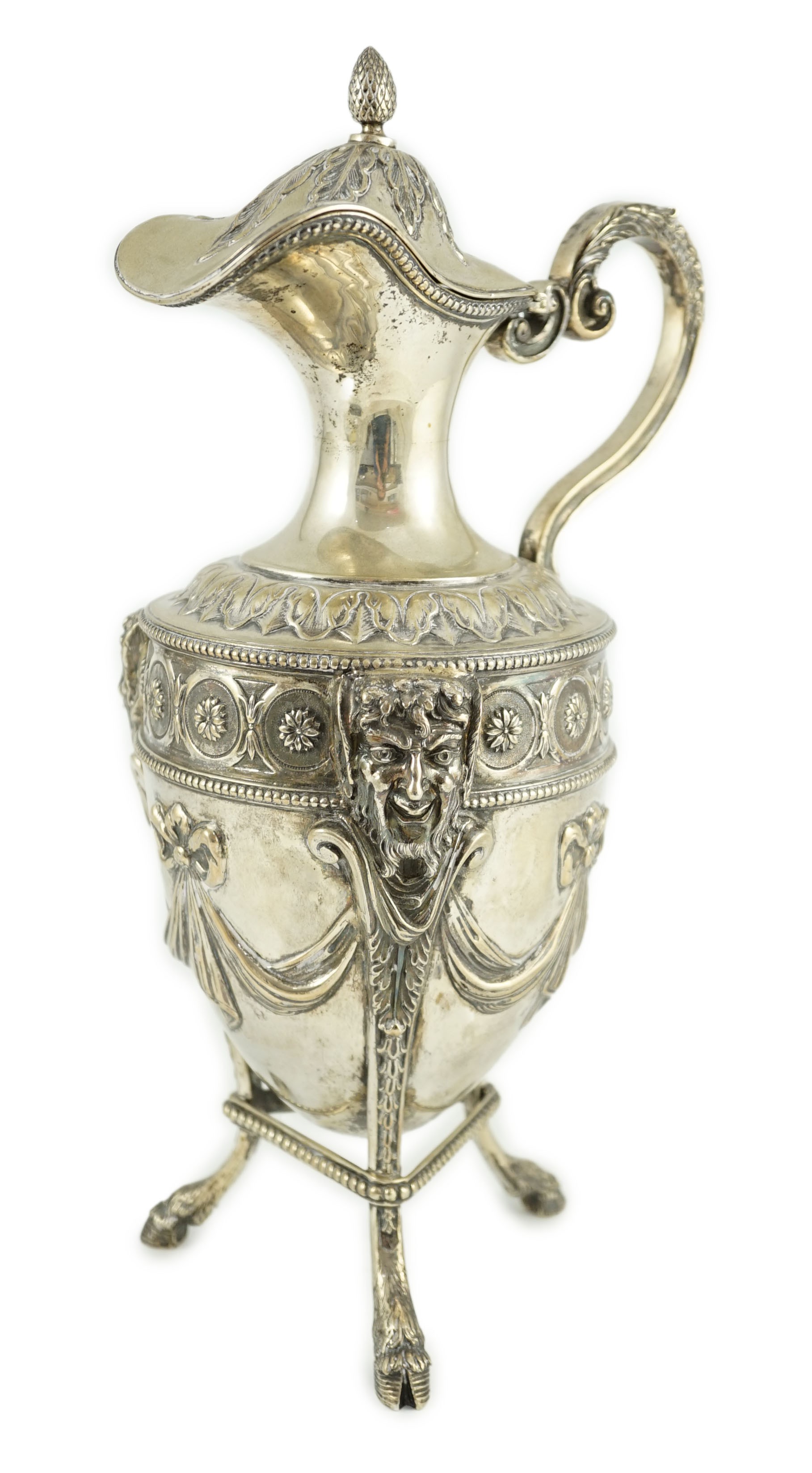 An 18th century French silver vase shaped claret jug